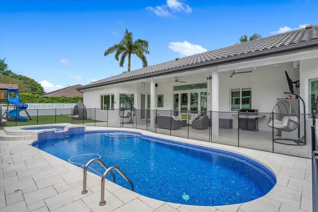 a view of outdoor space yard swimming pool and porch