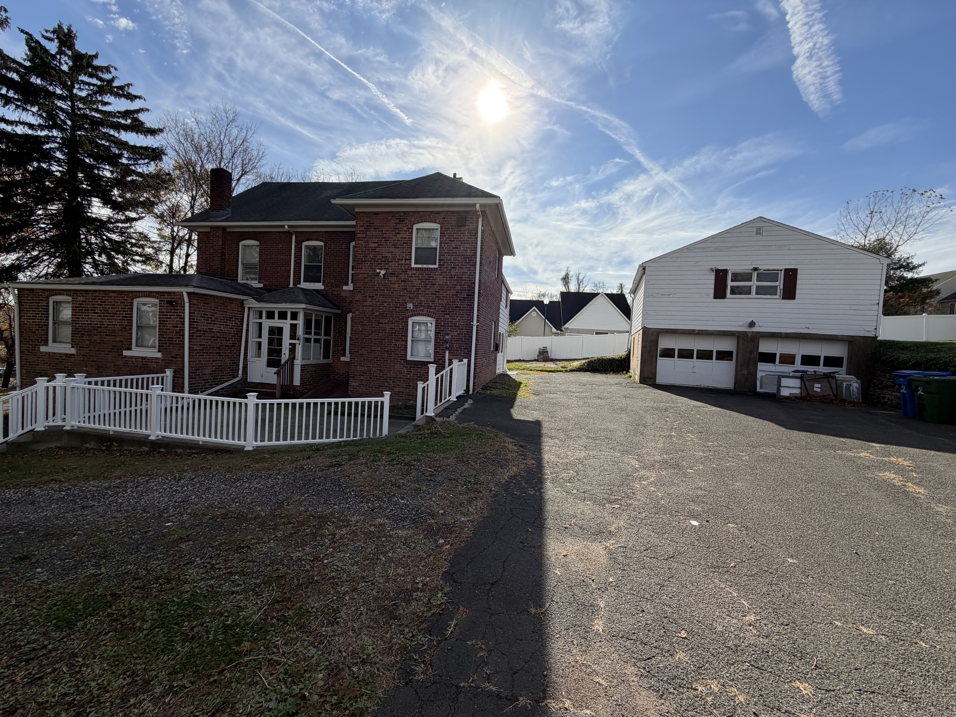 2964 State Street, Unit 2 Hamden, CT 06517 - Photo 2 of 16 a view of a house with a yard