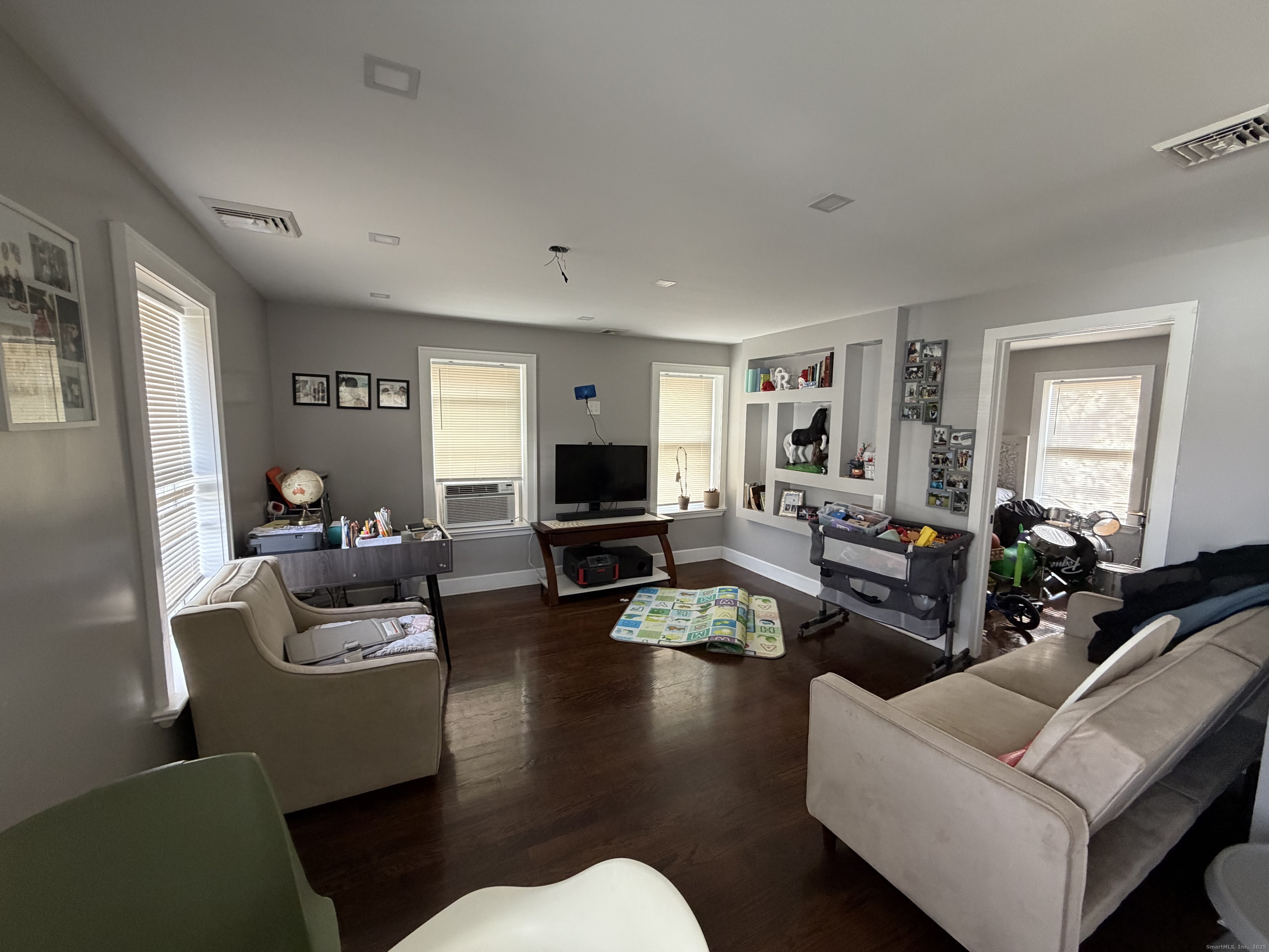 2964 State Street, Unit 2 Hamden, CT 06517 - Photo 6 of 16 a living room with furniture kitchen view and a window