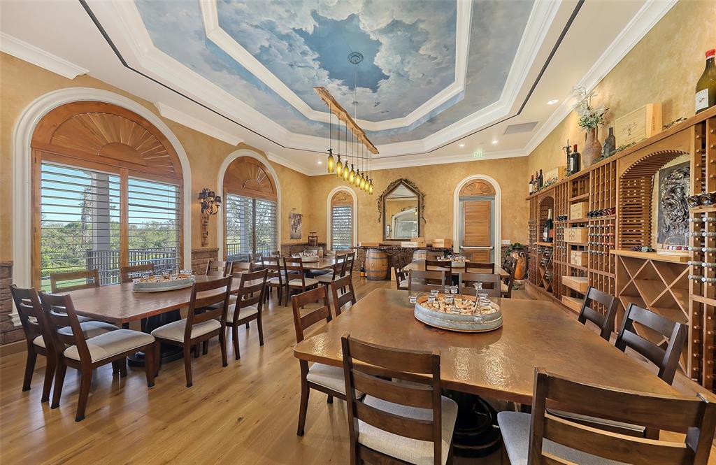 7717 US Open Loop Lakewood Ranch, FL 34202 - Photo 73 of 95 a view of a dining room with furniture window and outside view