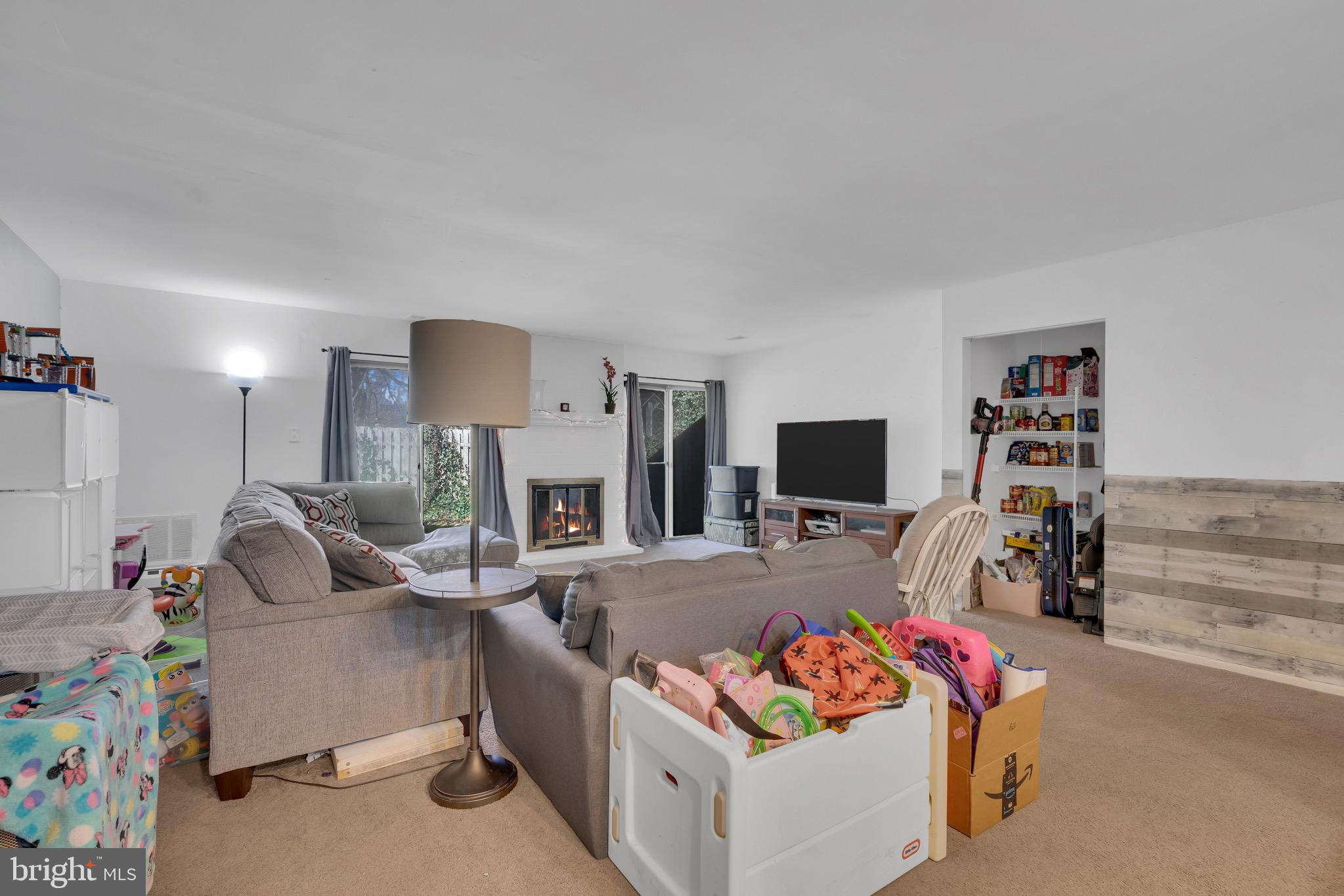 1802 Bromley Estate Pine Hill, NJ 08021 - Photo 11 of 26 a living room with furniture and a flat screen tv