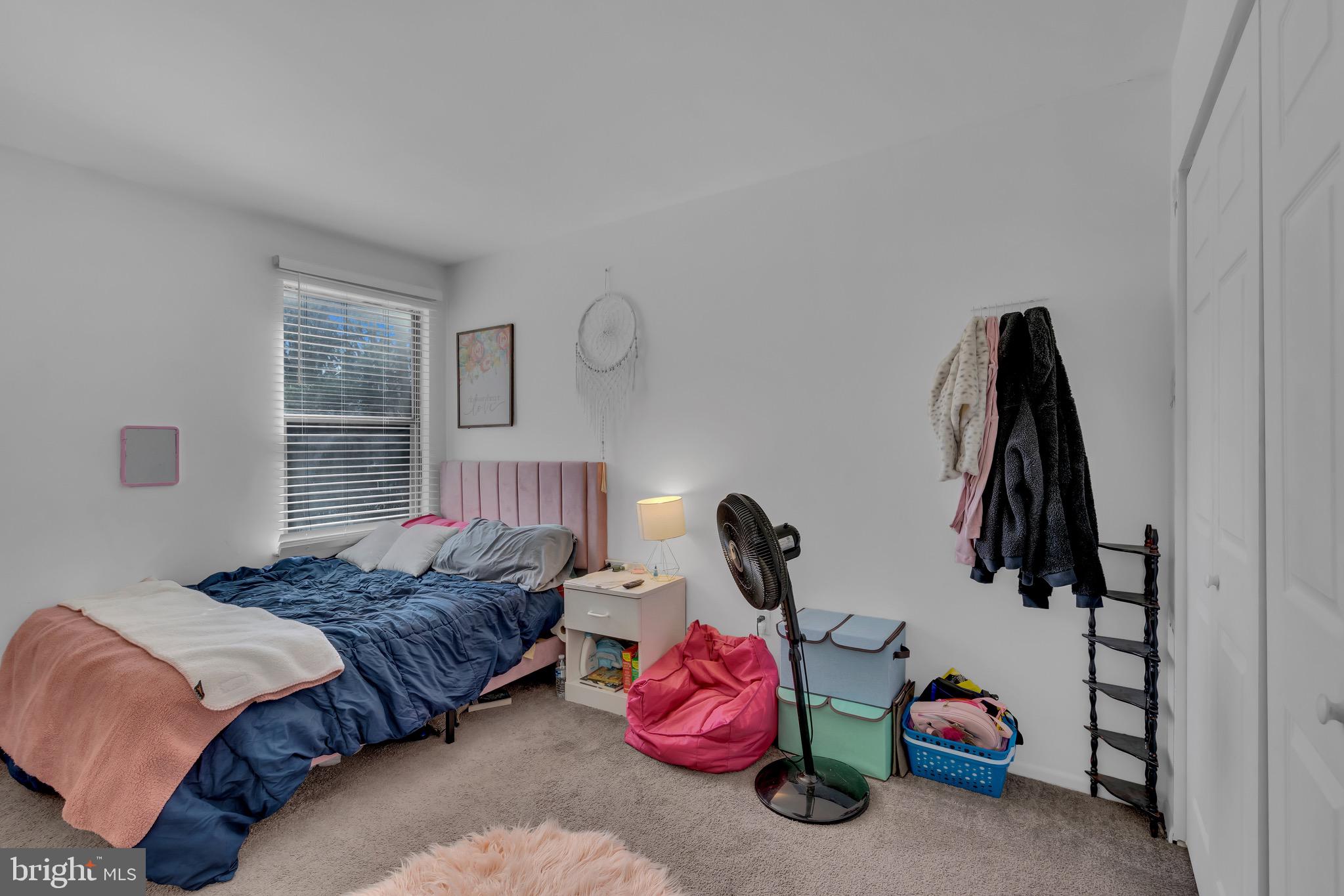 1802 Bromley Estate Pine Hill, NJ 08021 - Photo 16 of 26 a bedroom with a bed and a window
