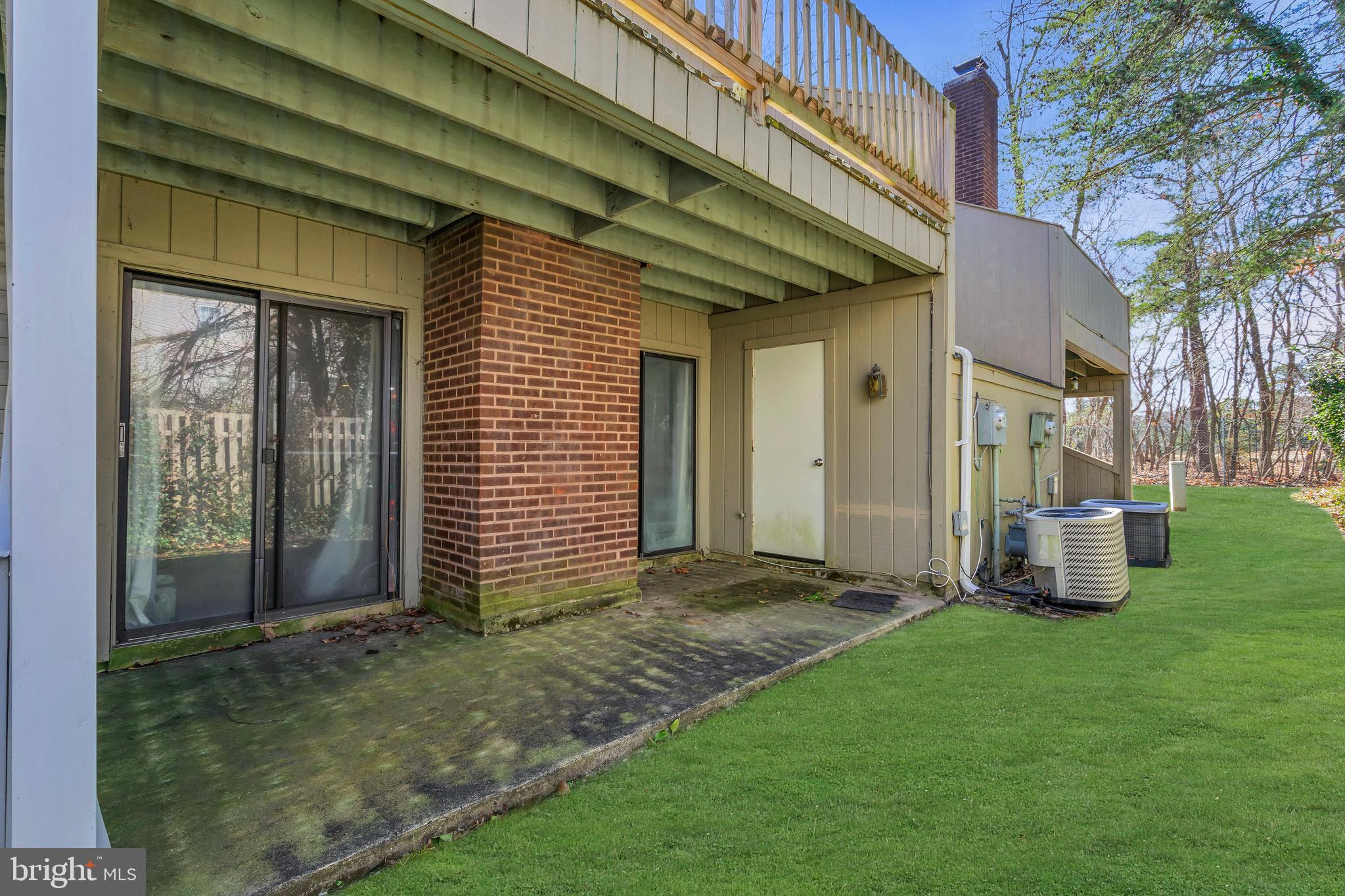 1802 Bromley Estate Pine Hill, NJ 08021 - Photo 23 of 26 a view of a backyard with plants and large tree