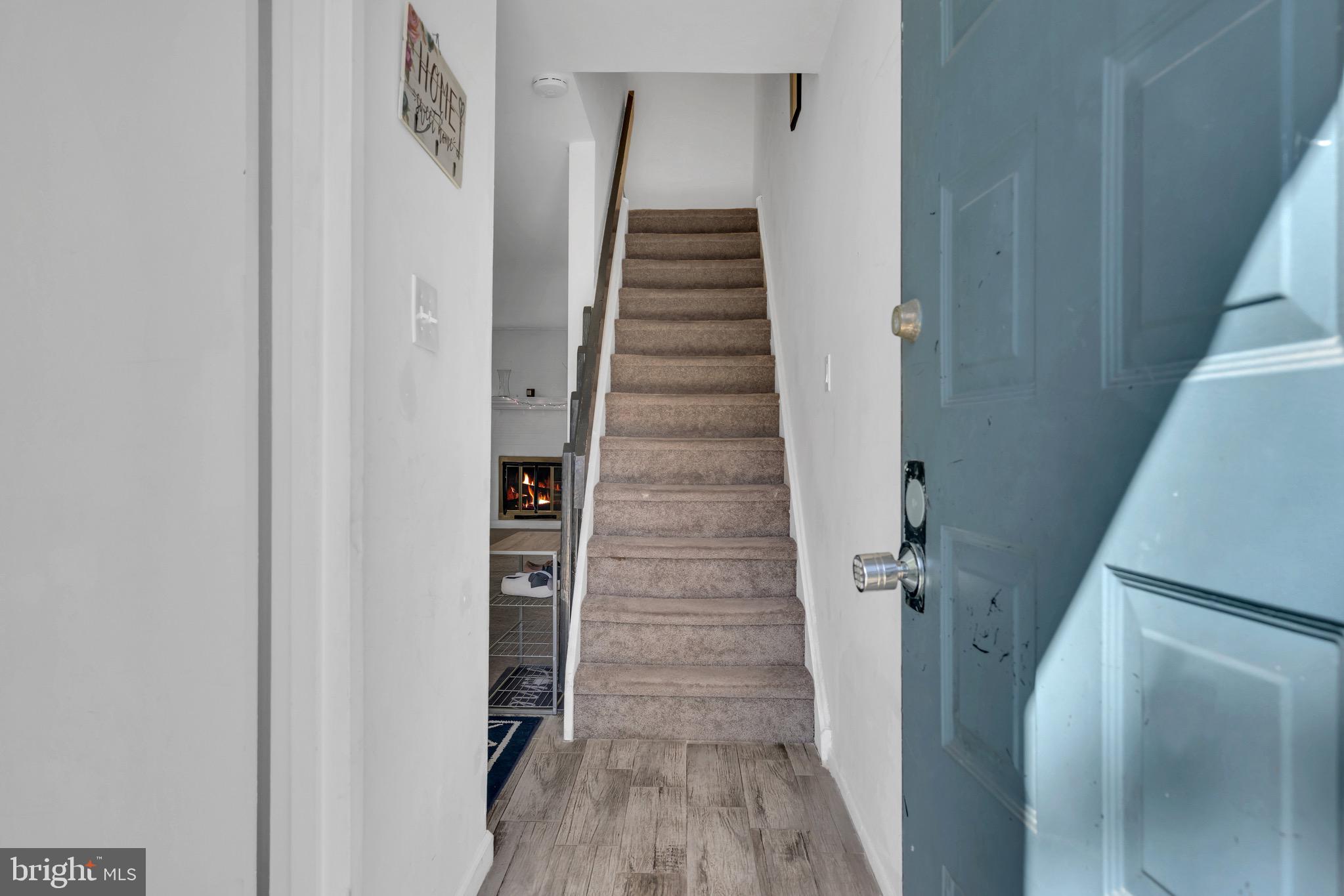 1802 Bromley Estate Pine Hill, NJ 08021 - Photo 6 of 26 a view of hallway with stairs and wooden floor