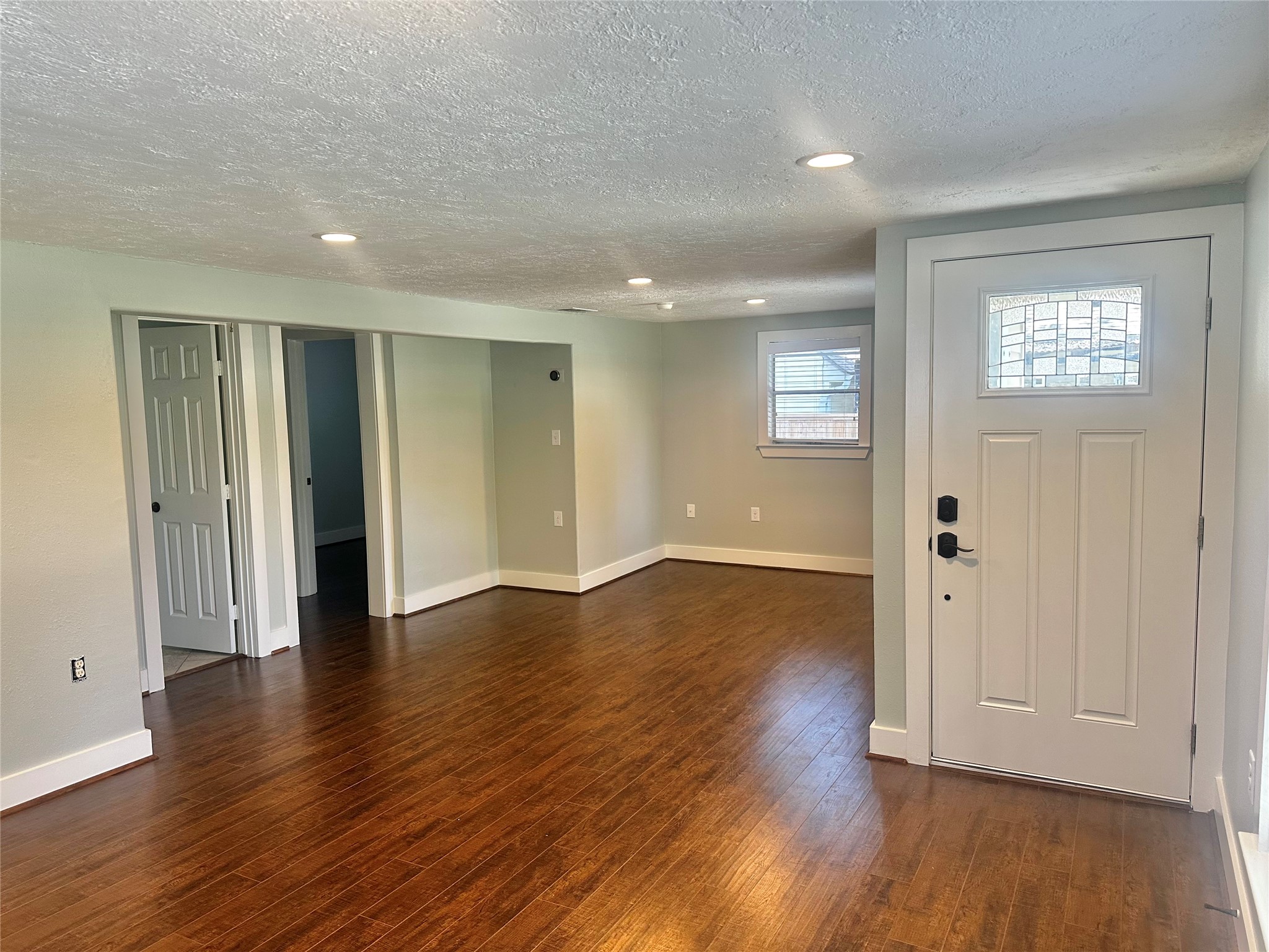 202 Fannin Street Tomball, TX 77375 - Photo 4 of 24 Front door entry into living and dining room area.