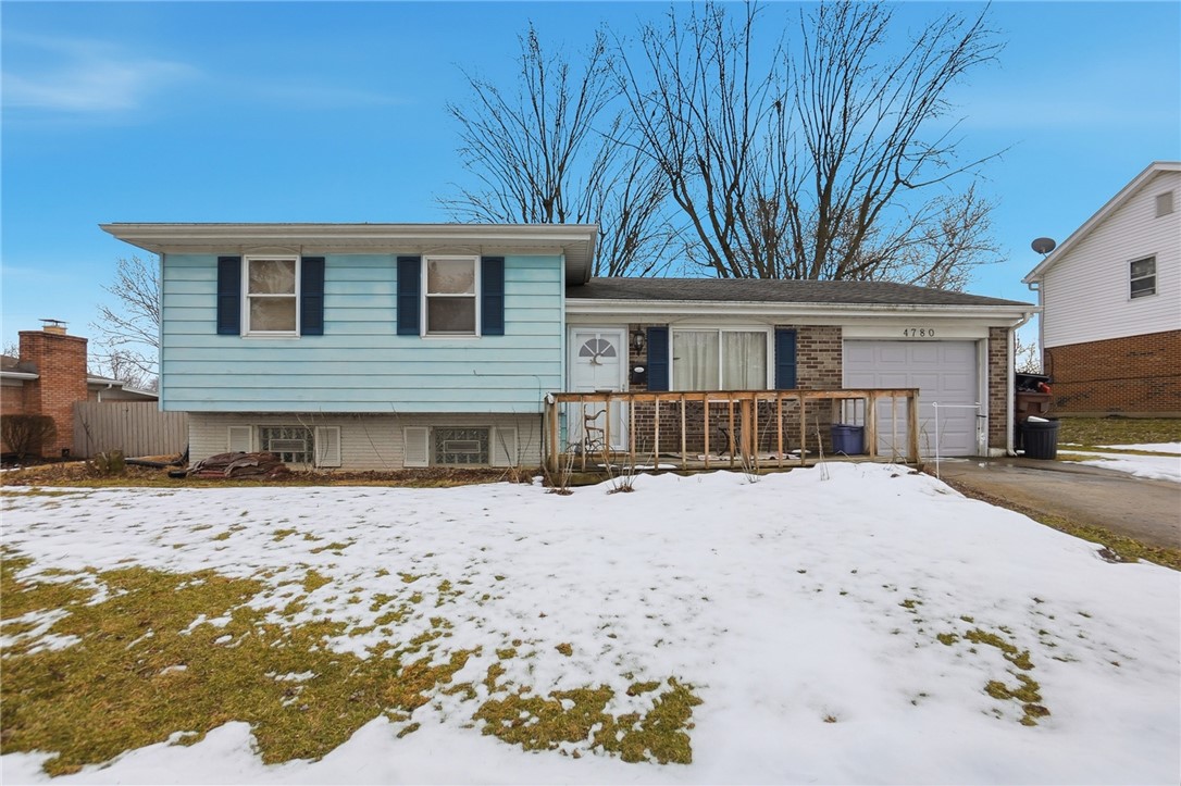 4780 Old Salem Road Englewood, OH 45322 - Photo 2 of 30 This charming home offers a cozy retreat with a classic brick and siding exterior.