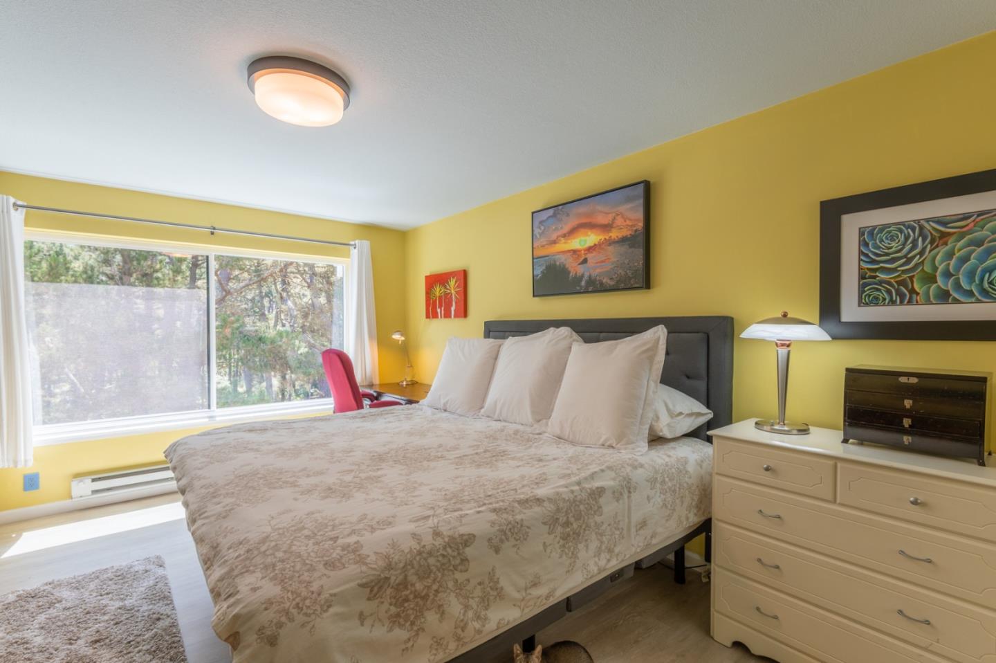 47 Shepherds Knoll Road, Unit 47 Monterey, CA 93940 - Photo 35 of 46 a bed sitting in a bedroom next to a window