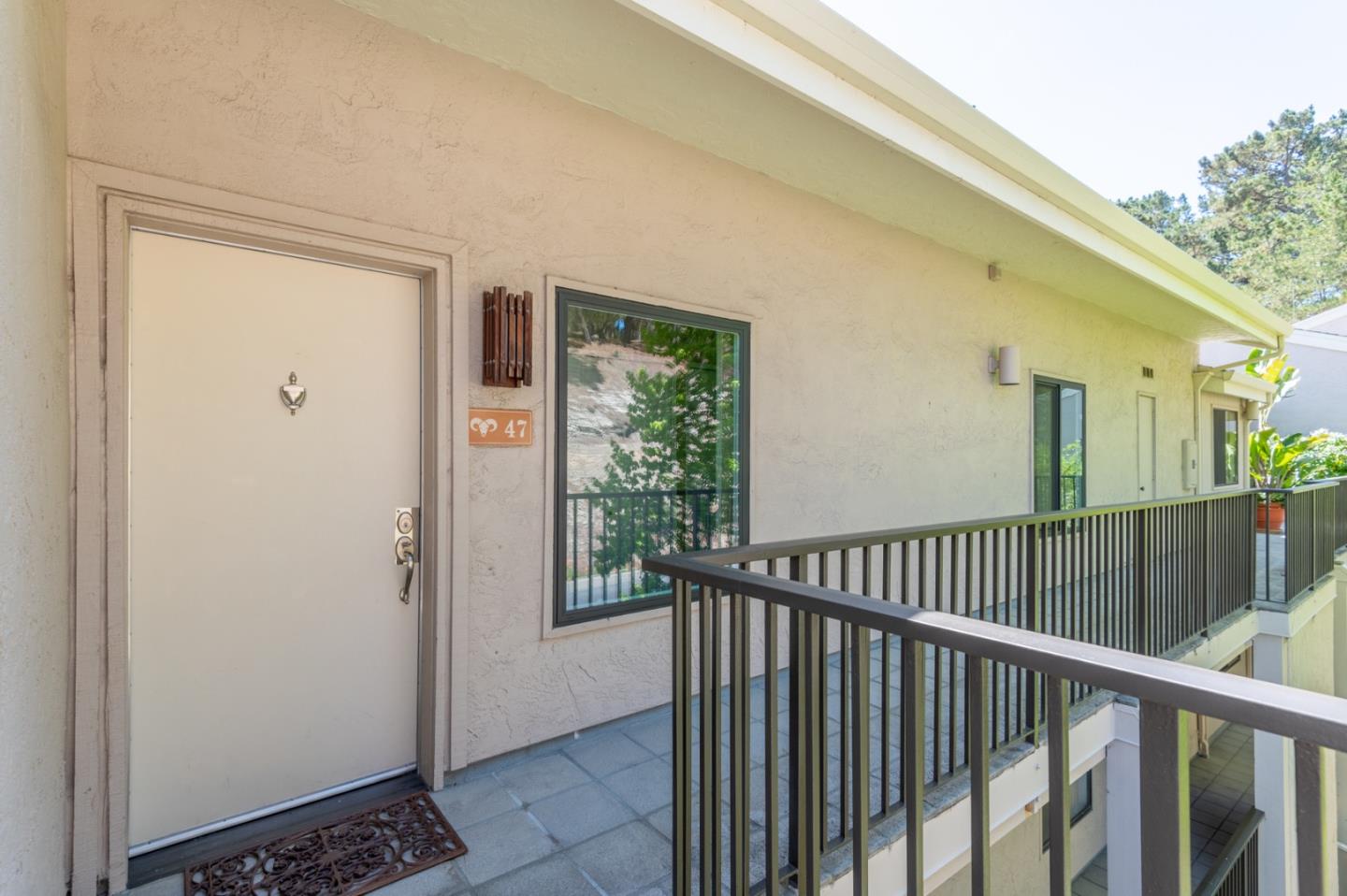 47 Shepherds Knoll Road, Unit 47 Monterey, CA 93940 - Photo 40 of 46 a view of a porch with wooden floor and stairs