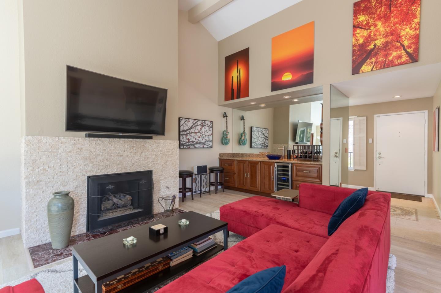 47 Shepherds Knoll Road, Unit 47 Monterey, CA 93940 - Photo 5 of 46 a living room with furniture or flat screen tv and a fireplace