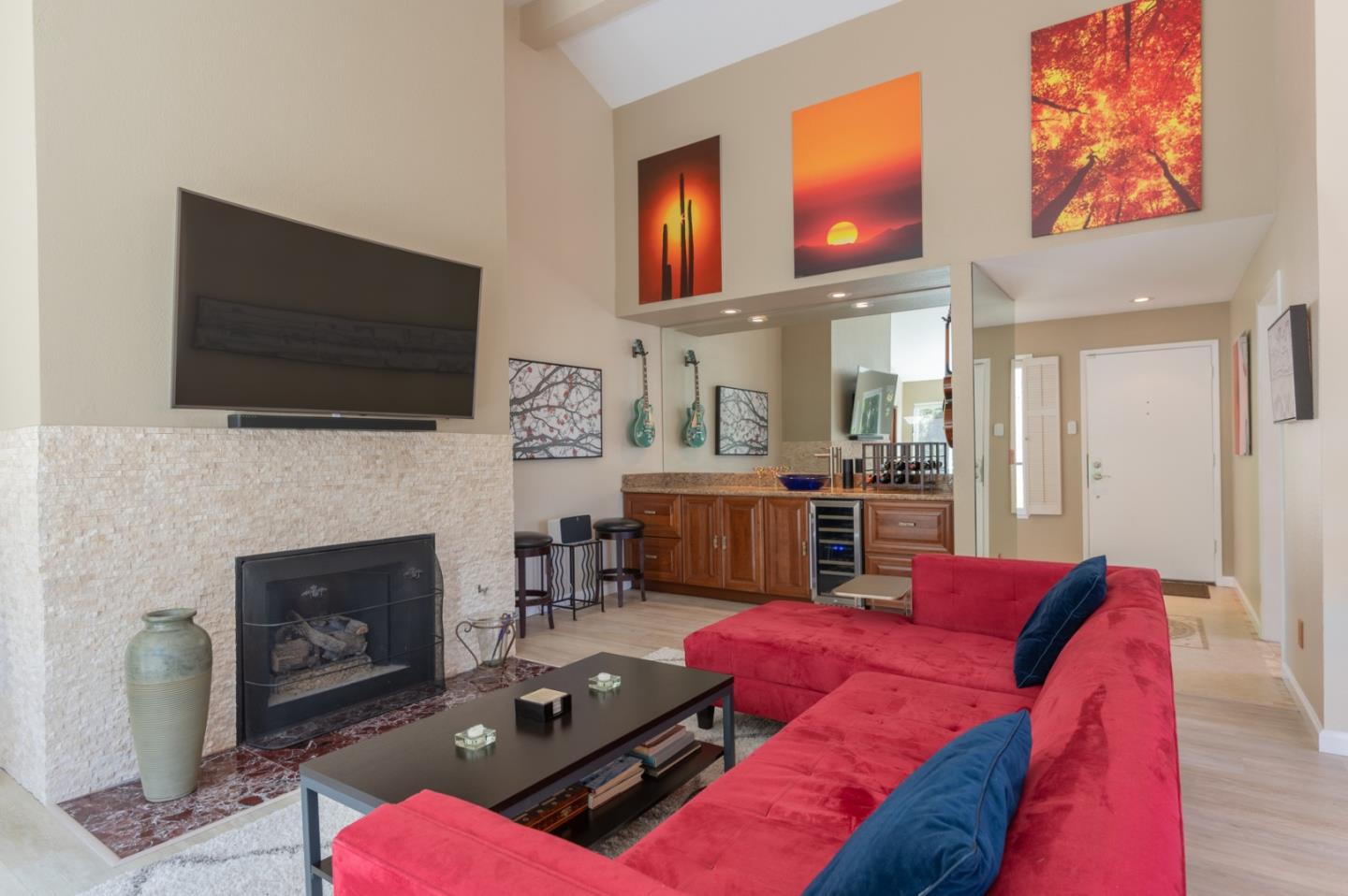 47 Shepherds Knoll Road, Unit 47 Monterey, CA 93940 - Photo 6 of 46 a living room with furniture a flat screen tv and a fireplace