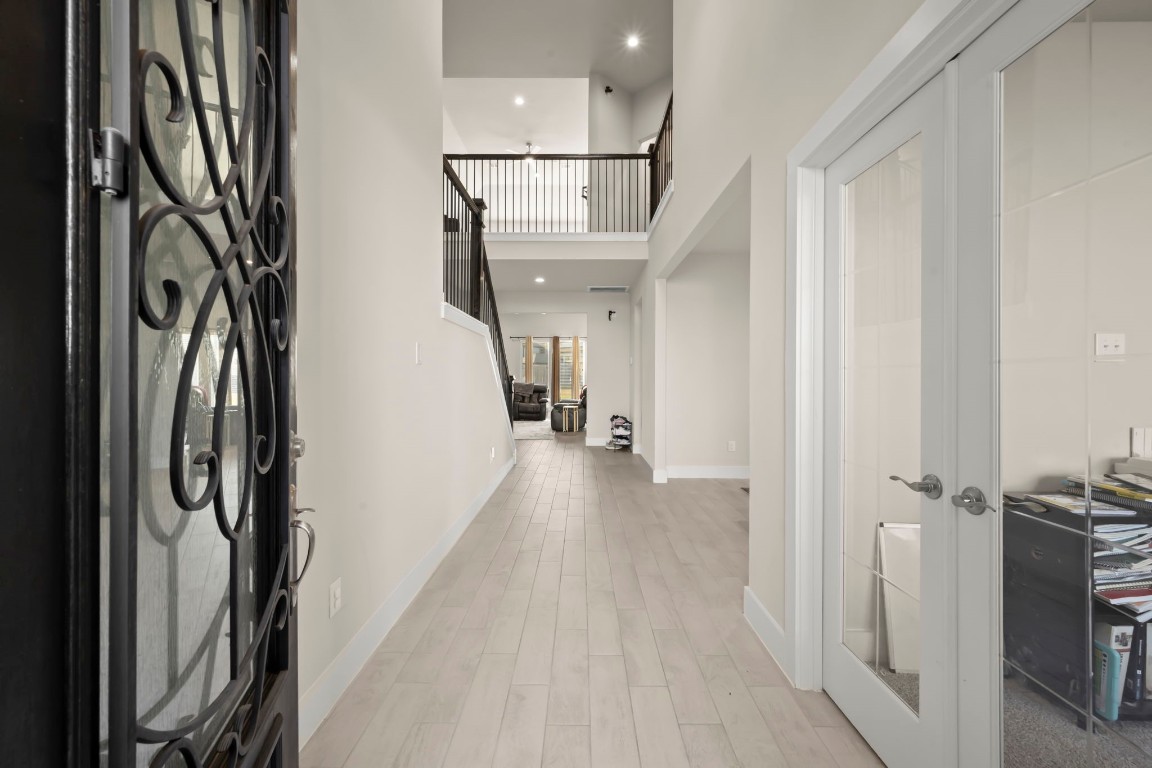 a view of hallway with stairs