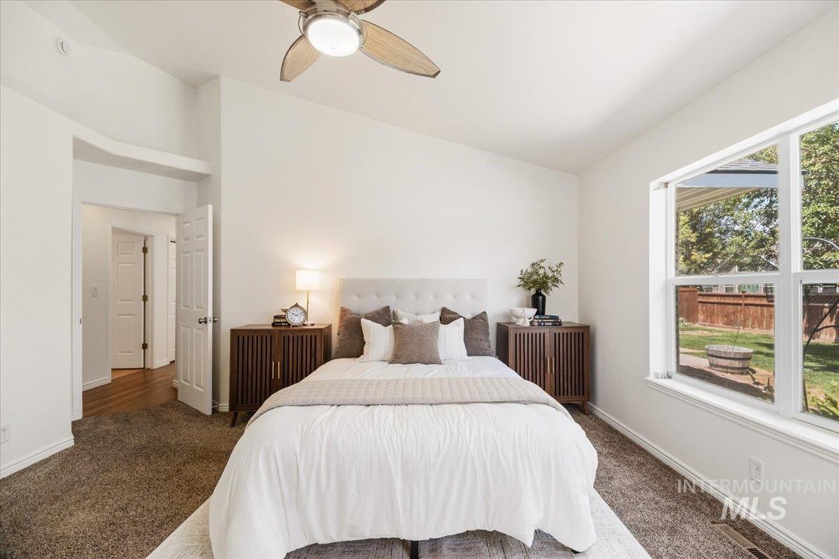 2032 Talus Loop Twin Falls, ID 83301 - Photo 31 of 43 Vaulted ceiling with an overhead fan light fixture
