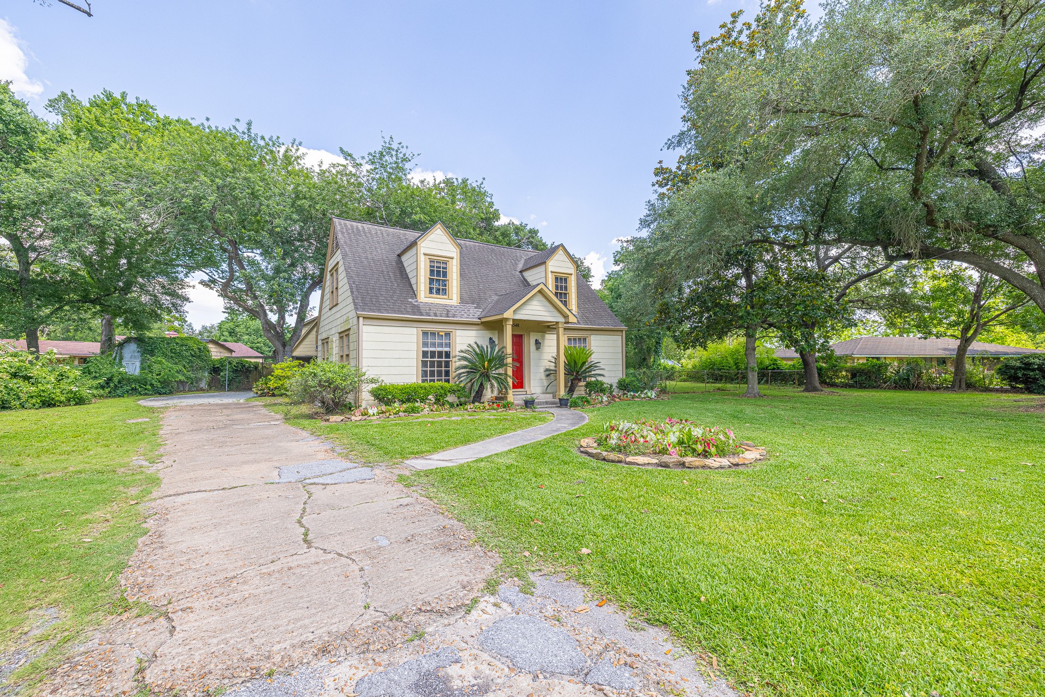 8548 Findlay Street Houston, TX 77017 - Photo 3 of 50 a front view of a house with garden