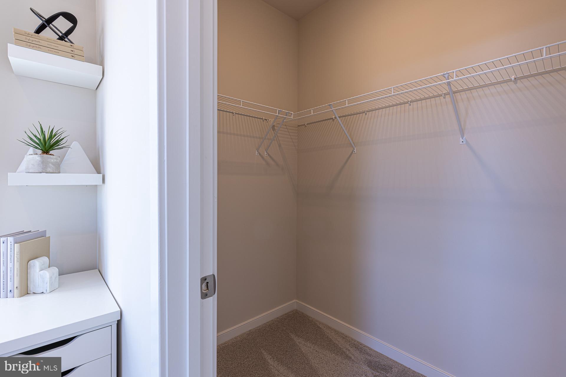20975 Bluebird Square Sterling, VA 20165 - Photo 9 of 23 a bathroom with a sink and a toilet