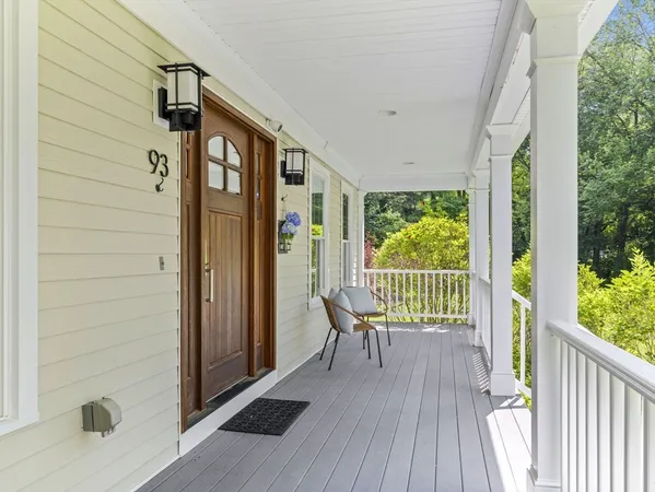 a view of a balcony with wooden floor