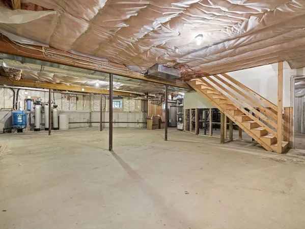 a view of an empty room with a garage