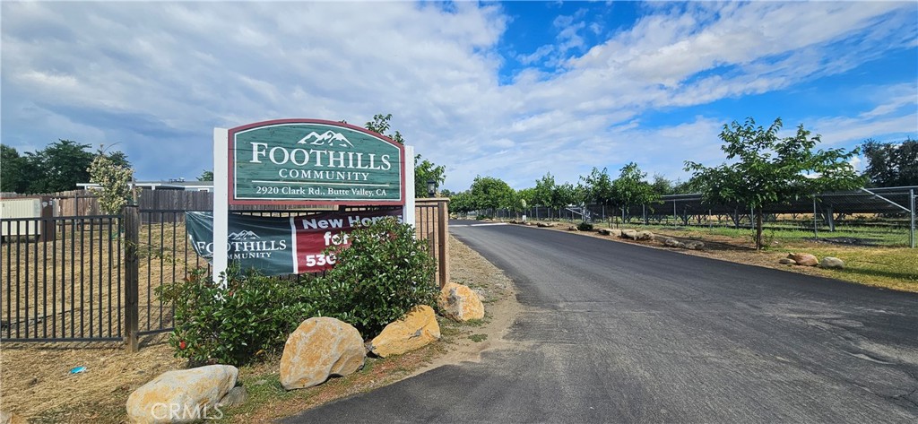 2920 Clark Road, Unit C12 Oroville, CA 95965 - Photo 17 of 17 a view of a park with iron fence