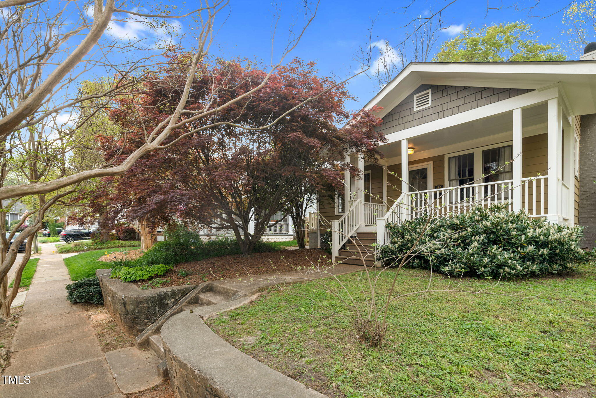 306 Perry Street Raleigh, NC 27608 - Photo 2 of 48 a front view of a house with garden