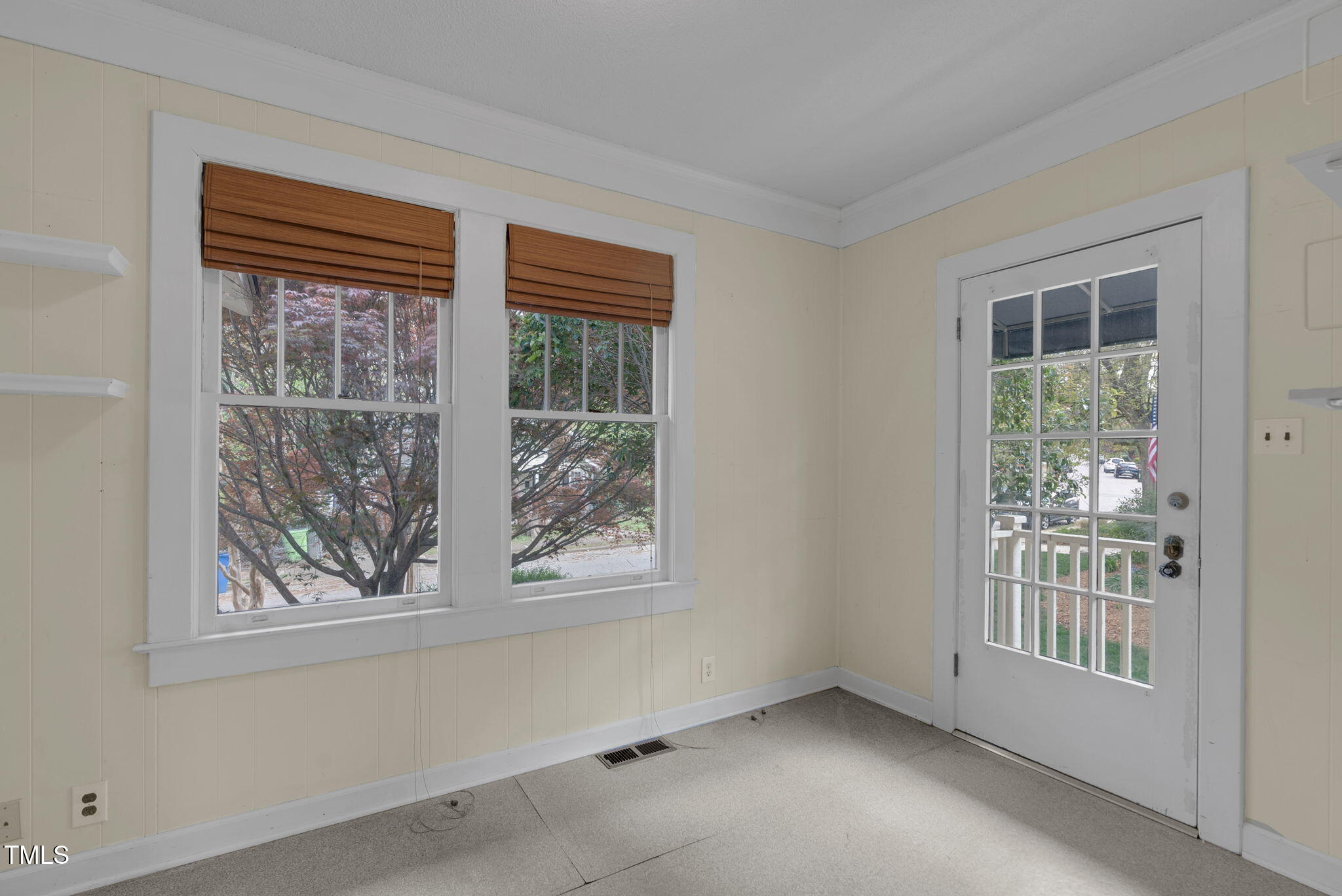 306 Perry Street Raleigh, NC 27608 - Photo 32 of 48 an empty room with windows