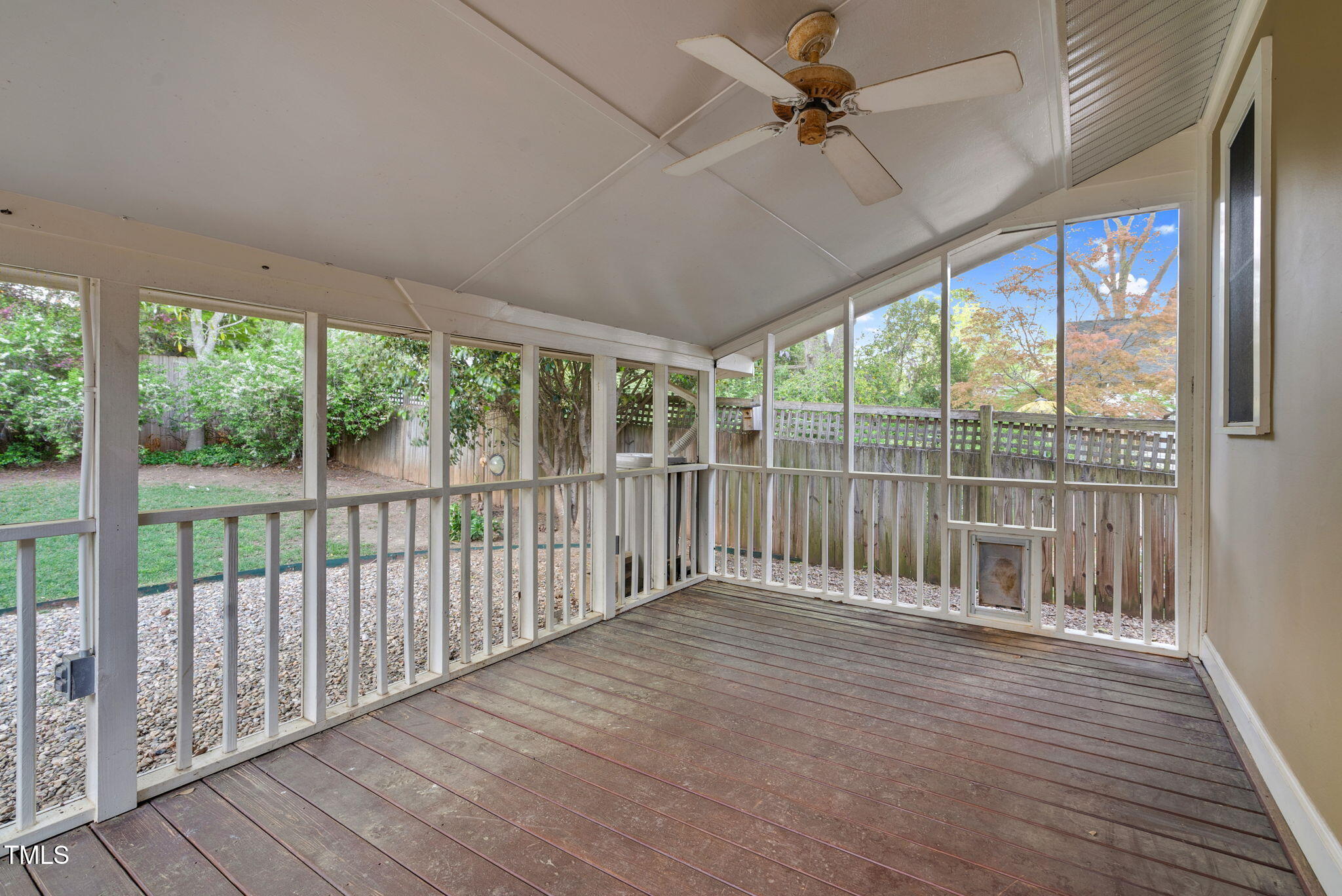 306 Perry Street Raleigh, NC 27608 - Photo 38 of 48 a view of a porch with wooden floor and outdoor space