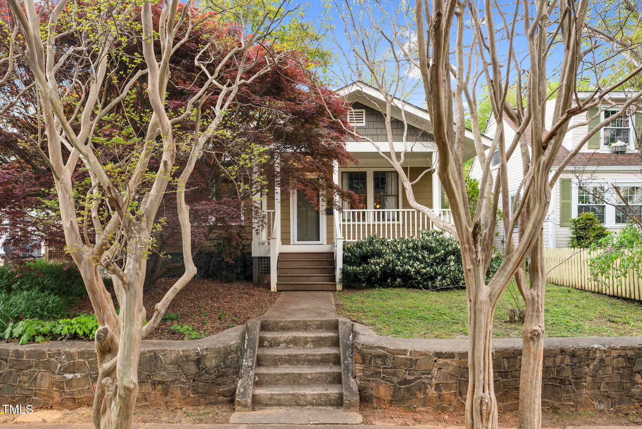 306 Perry Street Raleigh, NC 27608 - Photo 3 of 48 front view of a house with a yard
