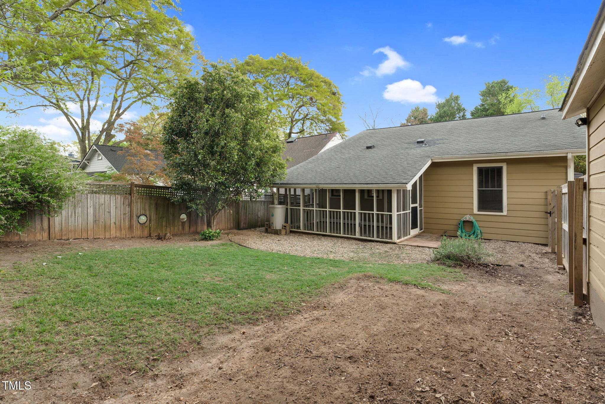 306 Perry Street Raleigh, NC 27608 - Photo 40 of 48 a view of a house with a yard
