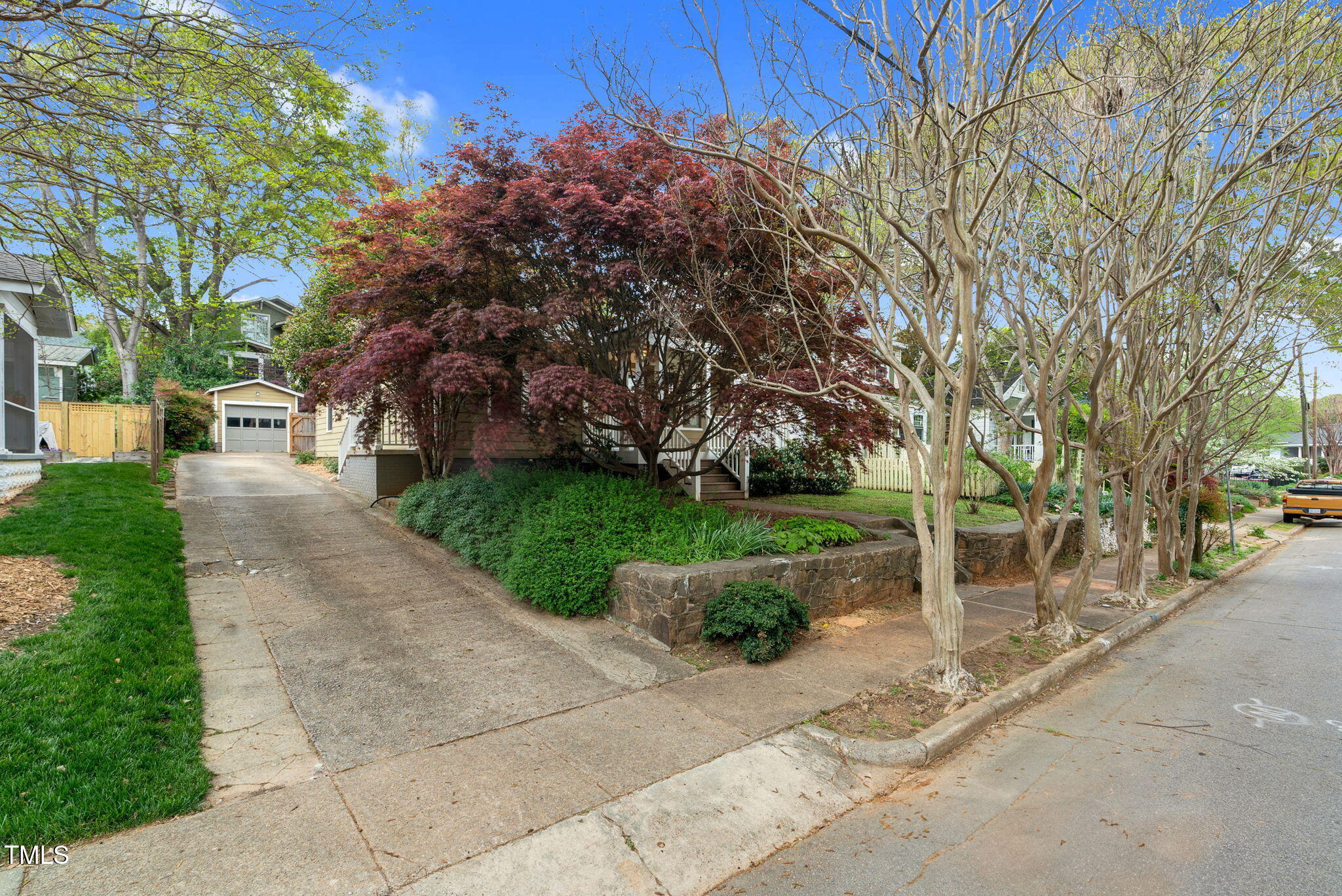 306 Perry Street Raleigh, NC 27608 - Photo 4 of 48 a view of a park with plants and trees