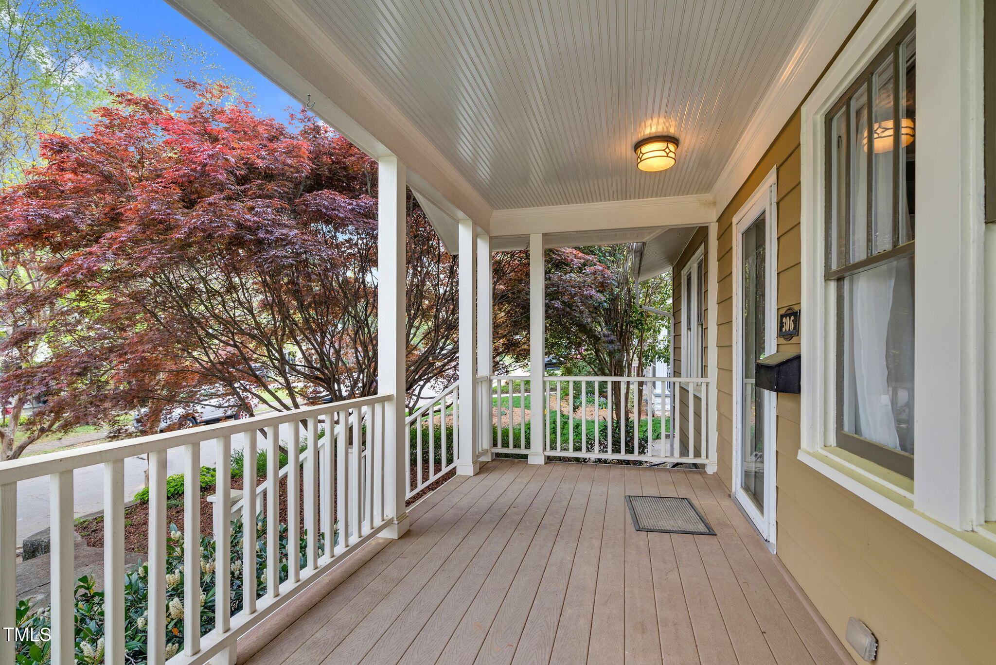 306 Perry Street Raleigh, NC 27608 - Photo 5 of 48 a view of a balcony with wooden floor