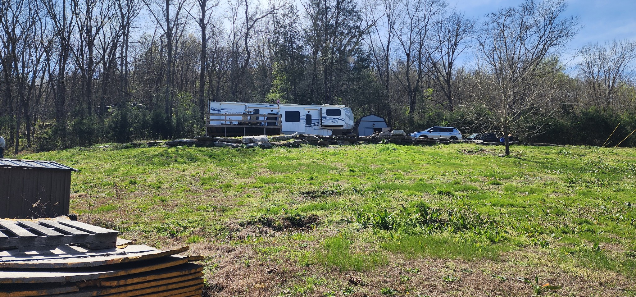 950 Chapman Hollow Road Dowelltown, TN 37059 - Photo 33 of 34 a backyard of a house with barbeque oven