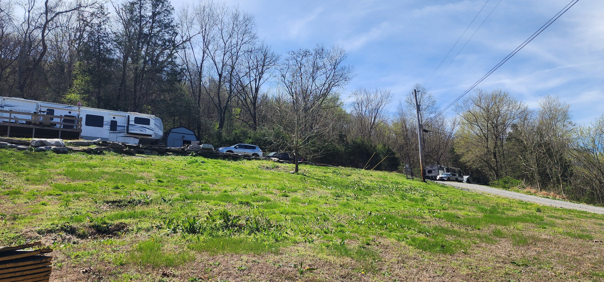 950 Chapman Hollow Road Dowelltown, TN 37059 - Photo 34 of 34 a view of a house with a big yard