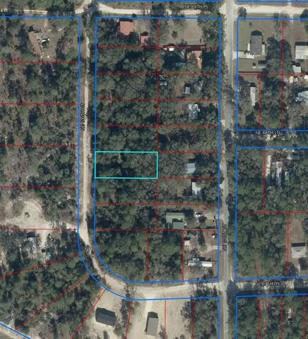 an aerial view of residential house with outdoor space