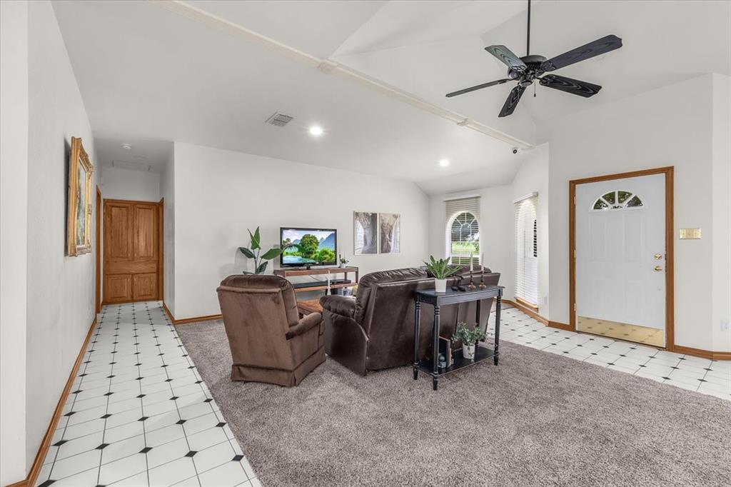 353 Hidden Meadow Court Rhome, TX 76078 - Photo 4 of 28 Living room with light colored carpet, ceiling fan, recessed lighting, and lofted ceiling