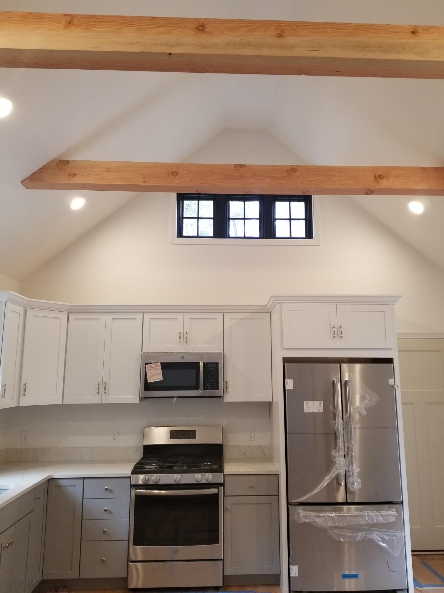 5 Bayberry Road Truro, MA 02666 - Photo 8 of 18 a kitchen with cabinets and appliances