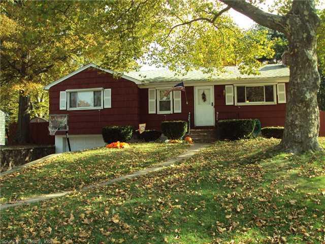 88 Old Stagecoach Road Meriden, CT 06450 - Photo 1 of 1 a front view of a house with a yard