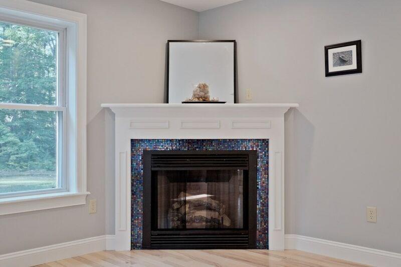 379 Flag Pond Road Saco, ME 04072 - Photo 9 of 35 Gas fireplace in living room