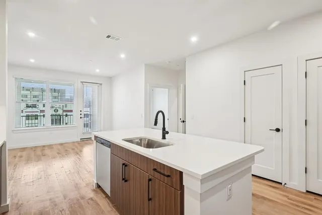 a utility room with cabinets