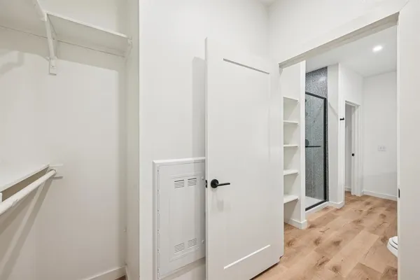 a view of an empty walk in closet