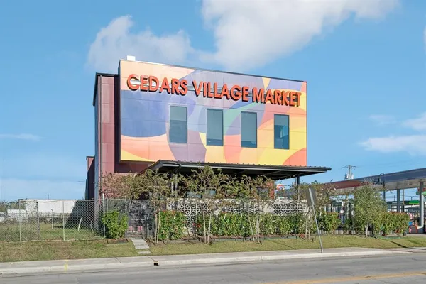 a sign on the corner of a building