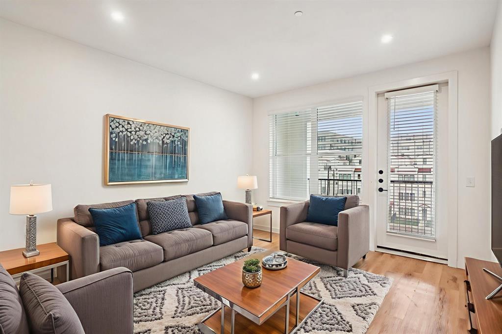 2016 South Ervay Street, Unit S1 Dallas, TX 75215 - Photo 3 of 35 a living room with furniture and a window