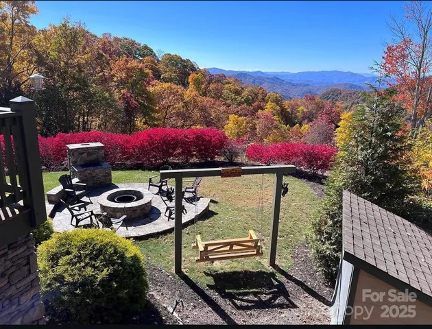 a view of a chairs and table in patio