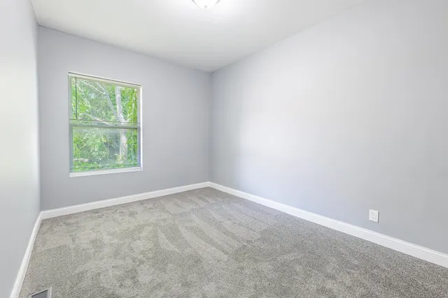 an empty room with a window