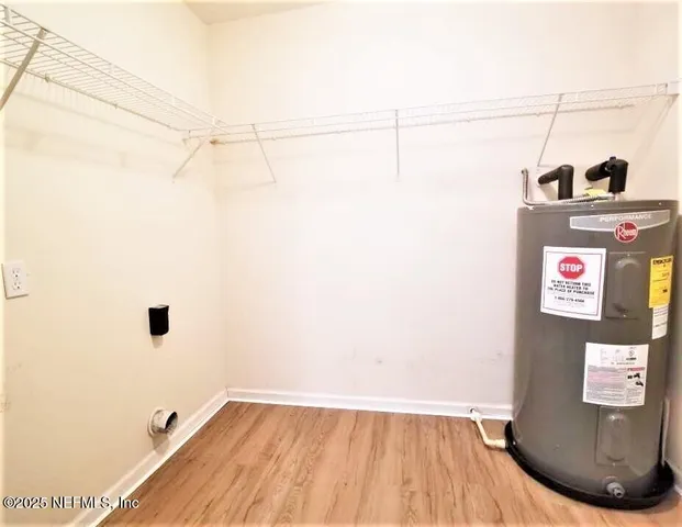 a view of a room with racks on the wall