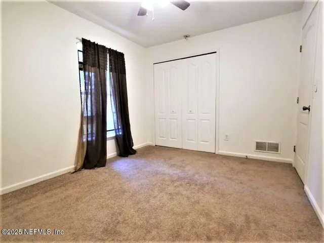 an empty room with closet