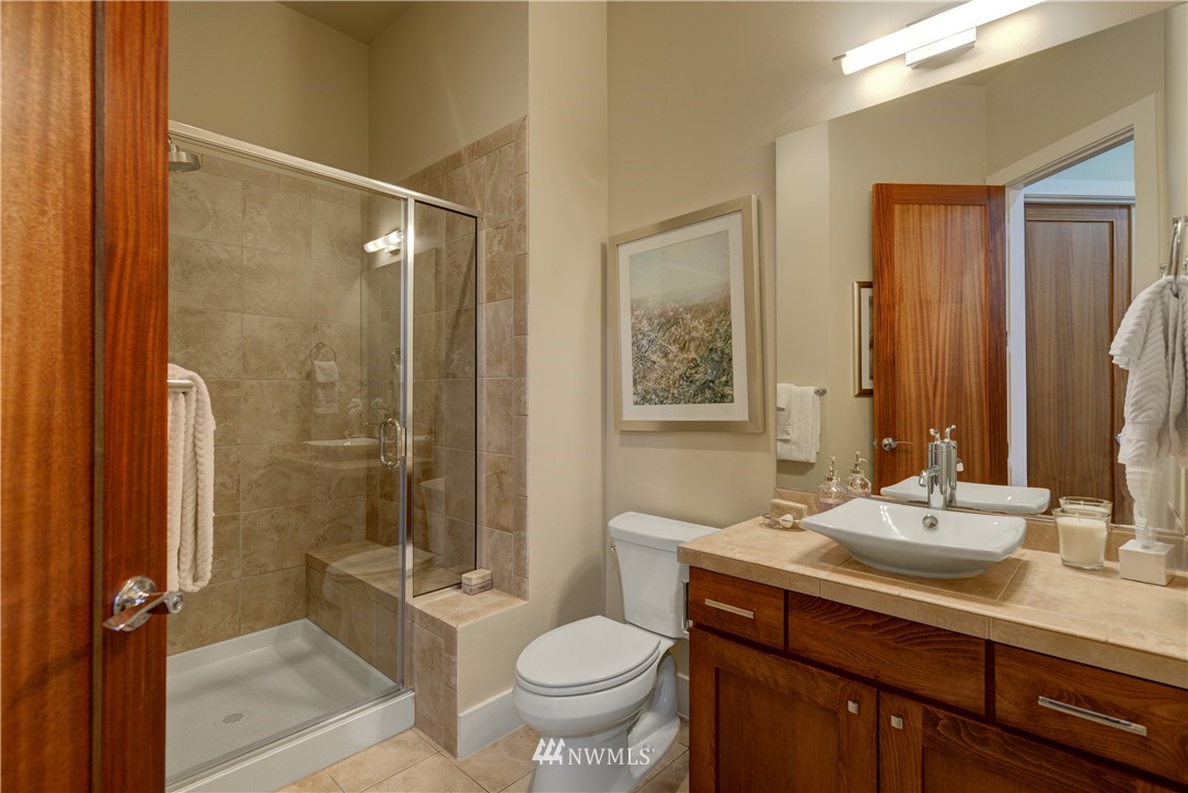 1105 North 41st Place Renton, WA 98056 - Photo 17 of 40 a bathroom with a sink toilet and shower