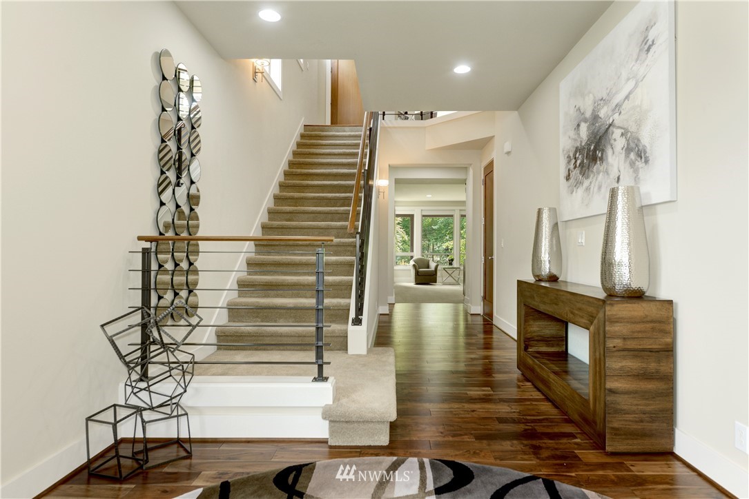 1105 North 41st Place Renton, WA 98056 - Photo 4 of 40 a view of entryway and hall with wooden floor