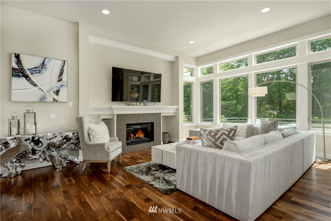 1105 North 41st Place Renton, WA 98056 - Photo 9 of 40 a living room with furniture and a fireplace