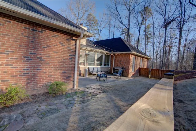 a kitchen with cabinets appliances and a window