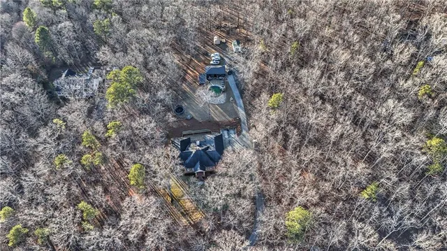 a view of a house with sitting area and wooden floor