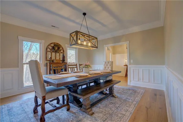a living room with furniture fireplace and flat screen tv