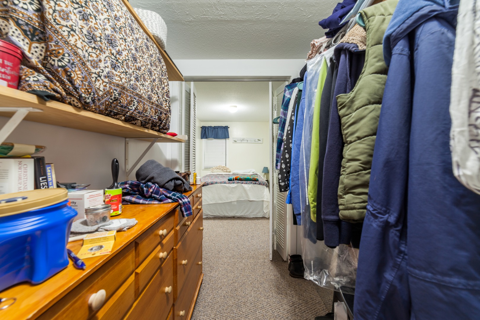 309 County Road Oak Bluffs, MA 02557 - Photo 12 of 32 a view of walk in closet with clothes and shoes